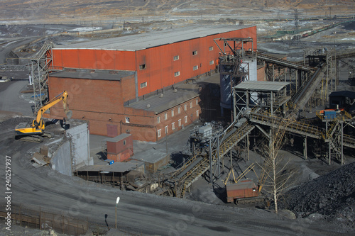 Industrial structures and a brick building on the territory of the copper smelter.