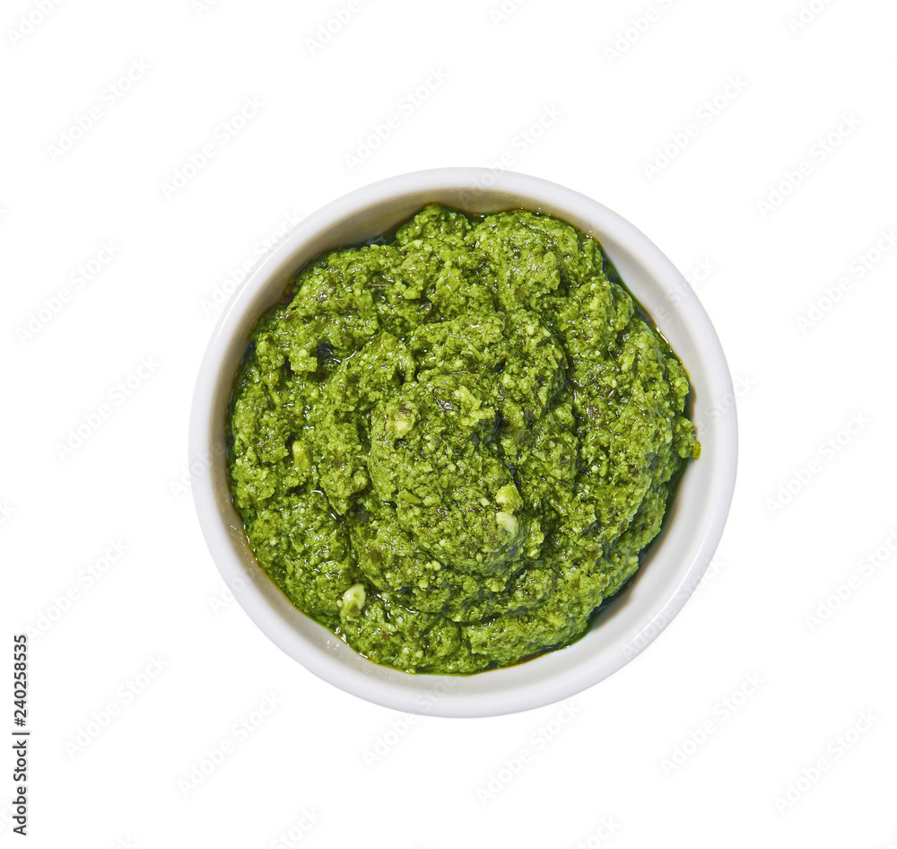 Italian sauce pesto, Pesto sauce in ceramic bowl isolated on a white background.Top view Italian sauce pesto, Pesto sauce in ceramic bowl isolated on a white background.Top view