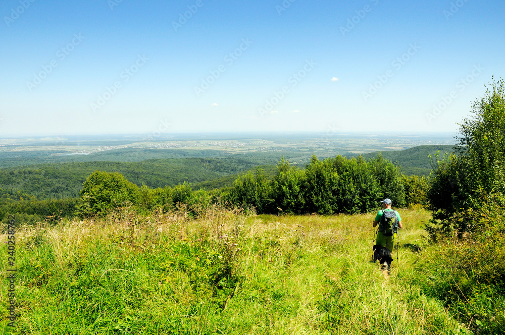 Traveling on a bright summer day in the mountains Traveling on a bright summer day in the mountains