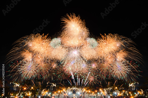 celebration colorful fireworks abstract background in the dark sky with copy space for festival holiday countdown to Happy New Year party in the park at night.