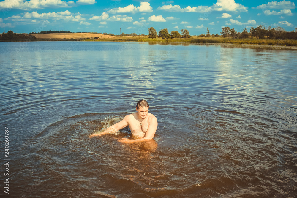 Man splashing in water Man splashing in water