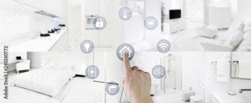 Fotografie smart home control concept hand touch icons screen with interiors, living room,