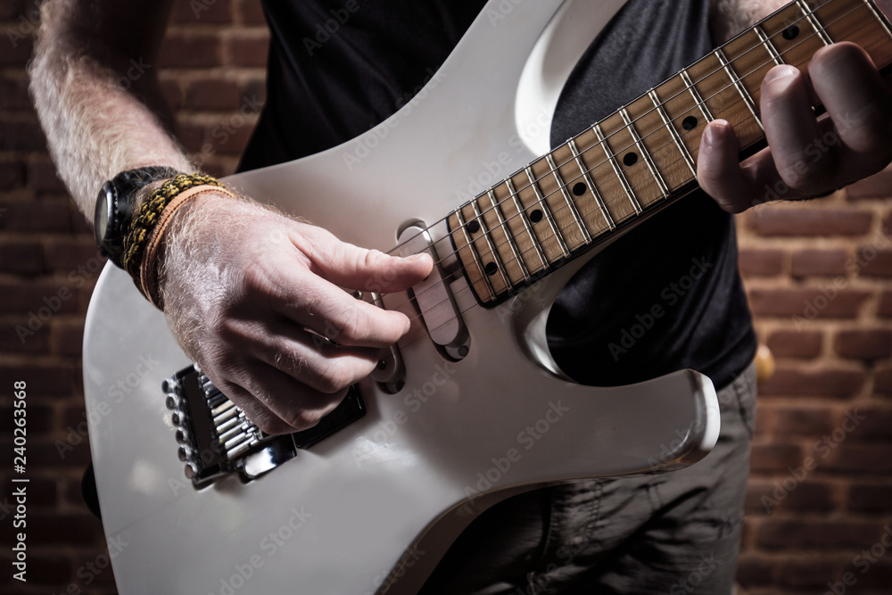 Fototapeta premium Playing white guitar