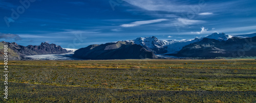 Glacier flows onto plain