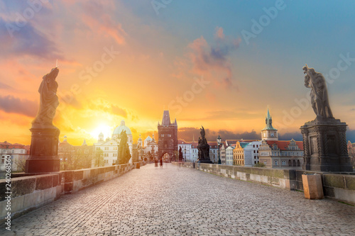 Fotografiet Charles Bridge Karluv Most and Old Town Tower at amazing sunrise with sky and clouds in Prague, Czech Republic