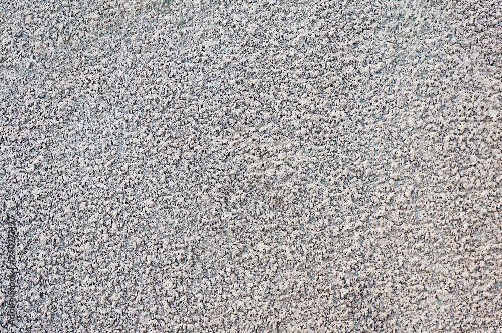 Background from old gray concrete wall with scratches and chips. Background from old gray concrete wall with scratches and chips.