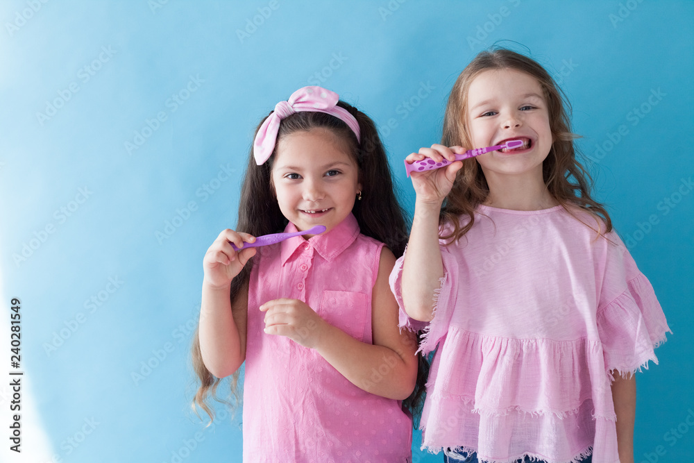 two beautiful small girls girlfriend sister in pink clothes two beautiful small girls girlfriend sister in pink clothes