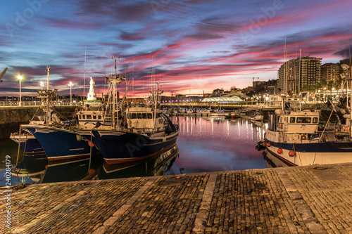 spectacular sunrise in the fishing port of Santurtzi