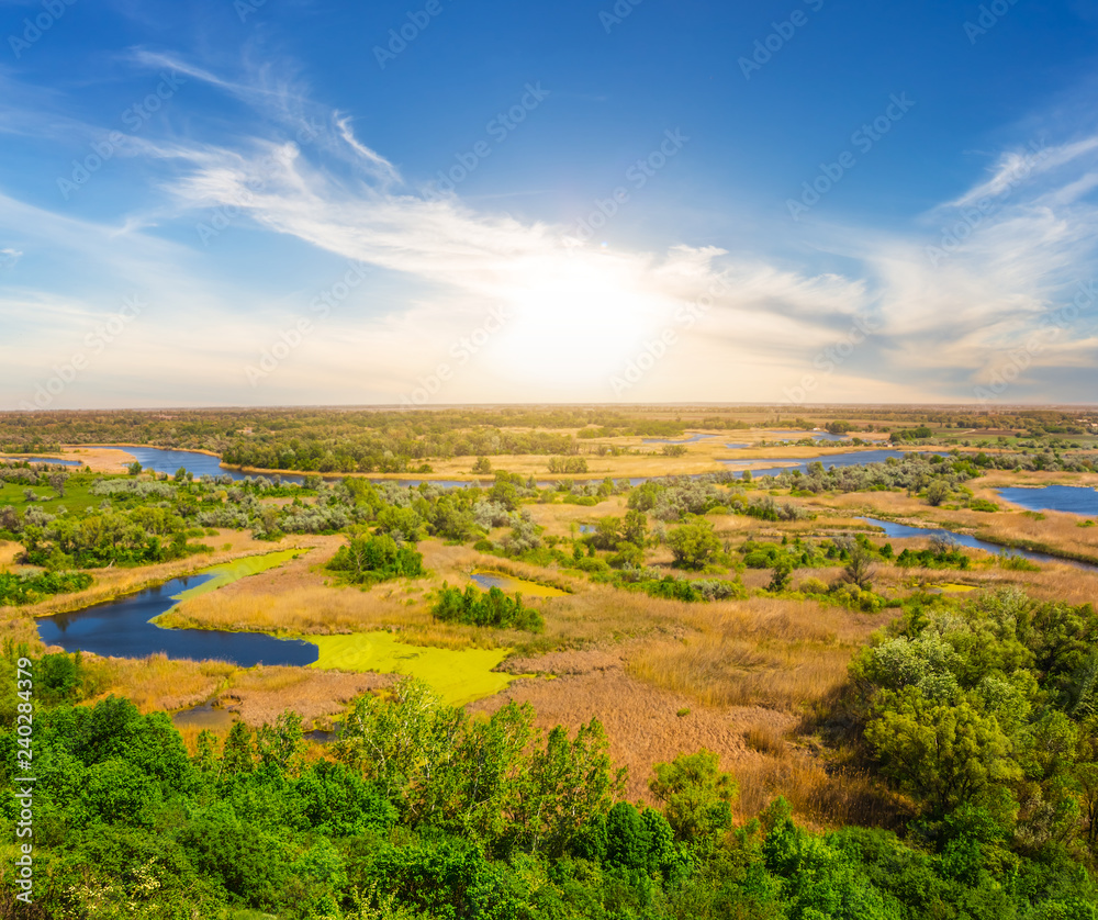 quiet river landscape at the sunset