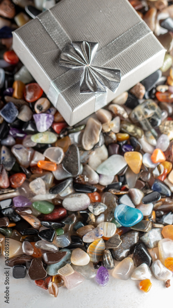 Gift box with semiprecious stones close up