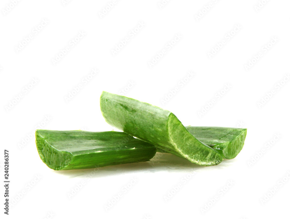 Close-Up Of Aloe Vera Slice On White Background Close-Up Of Aloe Vera Slice On White Background