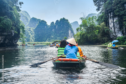 Trang An rowboats with beautiful mountains view  Ninh Binh  Vietnam