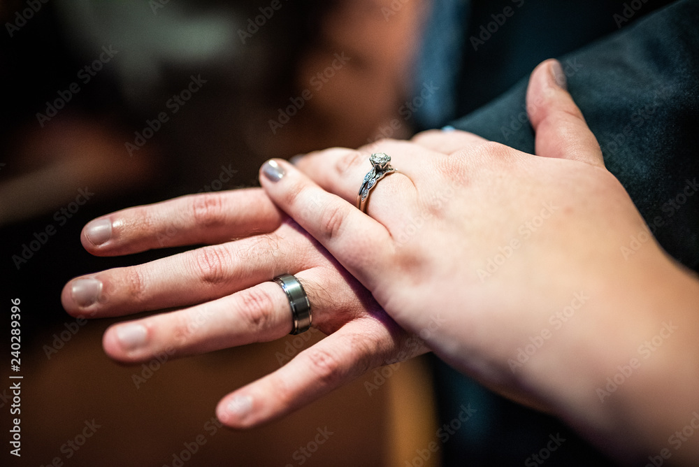 Newlyweds Holding Hands