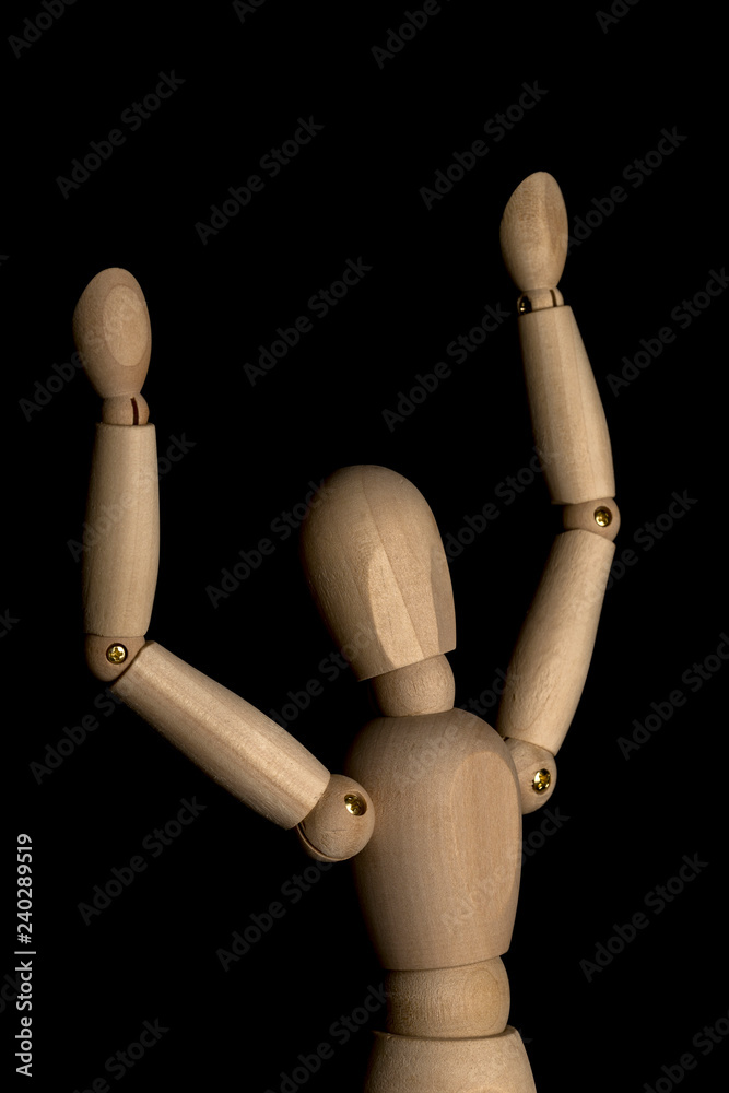 Business and Design Concept - Wooden Mannequin with Open Arm Gesture Isolated on Black Background Business and Design Concept - Wooden Mannequin with Open Arm Gesture Isolated on Black Background