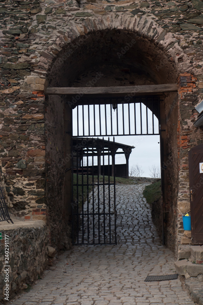 Fototapeta premium gate in the defensive wall of the old castle Bolkow
