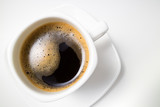 Coffee espresso. Cup of coffee on white background closeup. Top view
