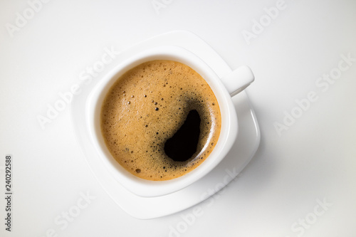 Coffee espresso. Coffee cup on white background closeup. Morning, breakfast, energy concept. Top view