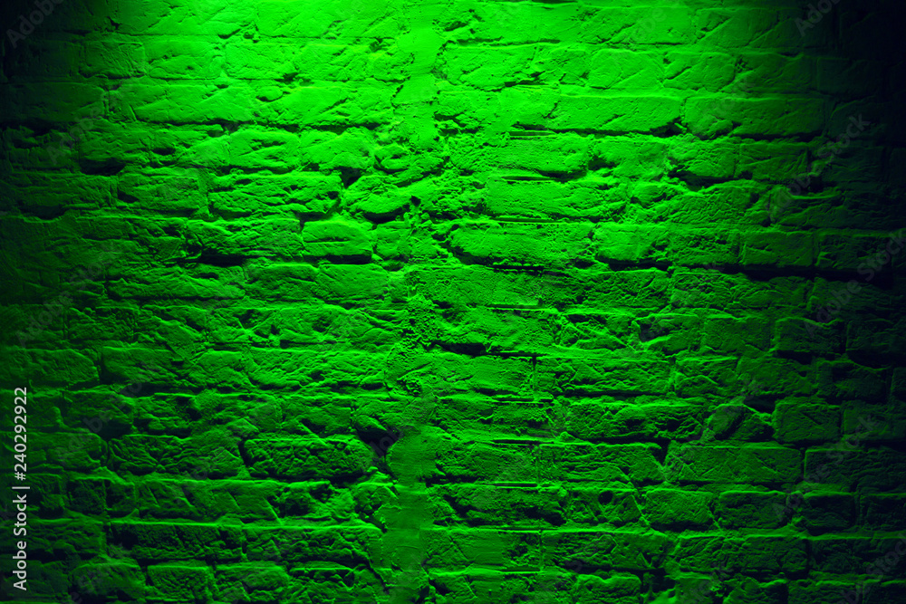 Fototapeta premium Grunge neon green brick wall texture background. Magenta colored brick wall texture architecture pattern.