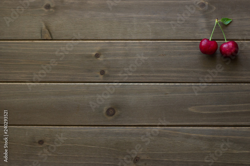 bing cherries on a flat lay wooden board