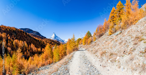 Road in the mountain with a view to Matterhorn photo