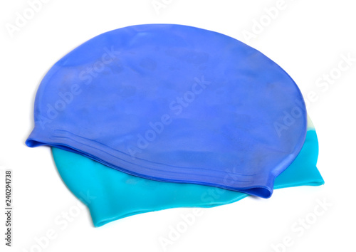 Two swimming caps, swim caps or bathing caps isolated on white