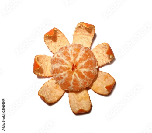 Juicy tangerine is isolated on a white background.
