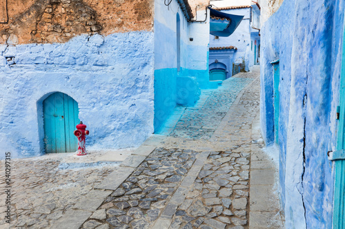 street with hydrant in blue city Chefchaouen in Morocco © sergejson