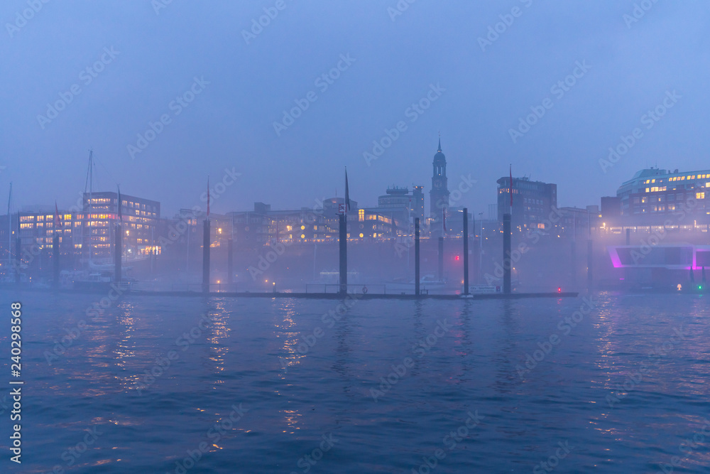Hamburg Harbor, Germany, with a view of the Sports Harbor at night.