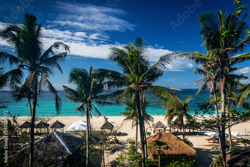 famous puka beach on tropical paradise boracay island in philippines photo