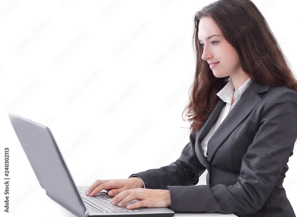 side view.business woman typing on a laptop. side view.business woman typing on a laptop.
