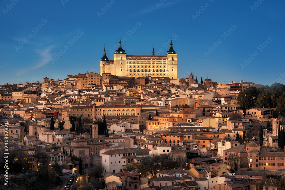 Toledo, Spain old town cityscape and Alcazar at dusk