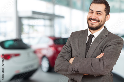 business man at the auto dealer © izzetugutmen