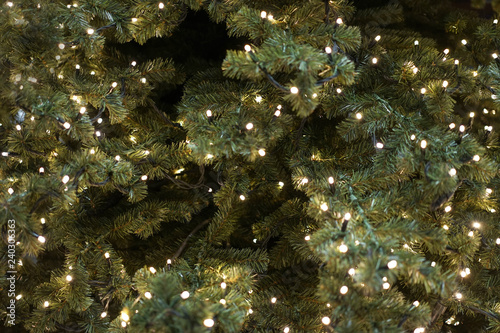 Blurred Decorated Christmas tree background.
