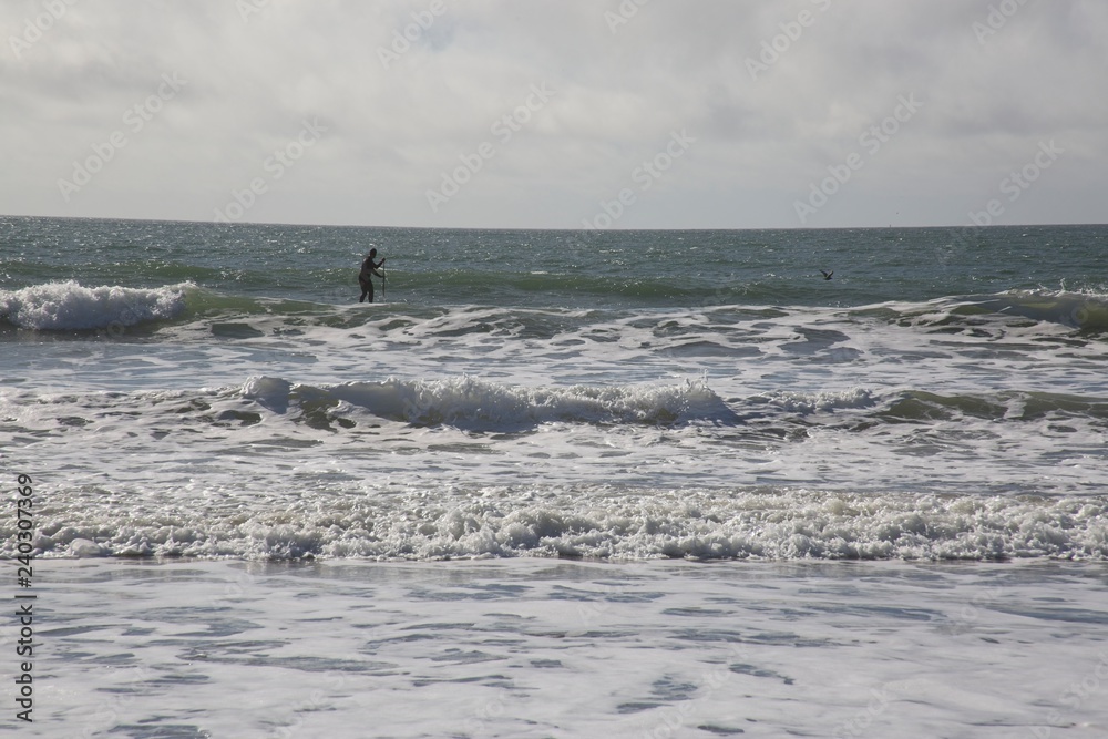 Surfers in Stinson Beach