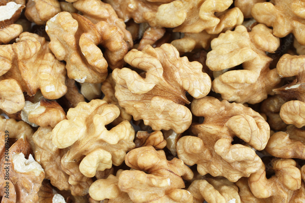 Food background - big shelled walnuts situated arbitrarily Food background - big shelled walnuts situated arbitrarily
