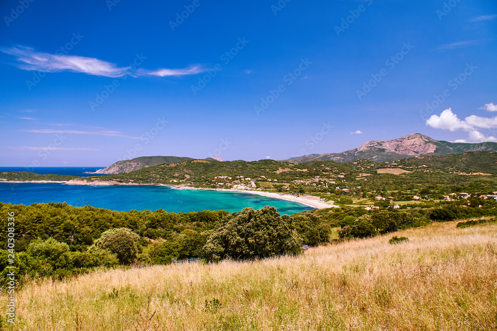 Beautiful lagoon with turquoise water in Corsica on sunny day without clouds
