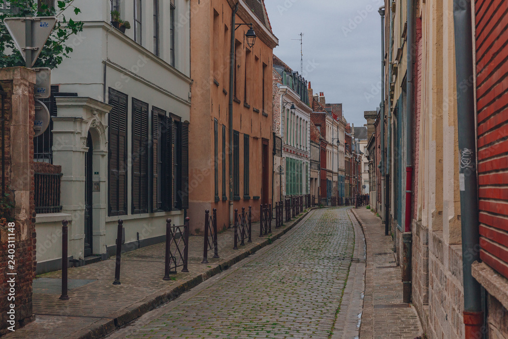 Obraz premium Empty street with traditional architecture in the city center of Lille, France