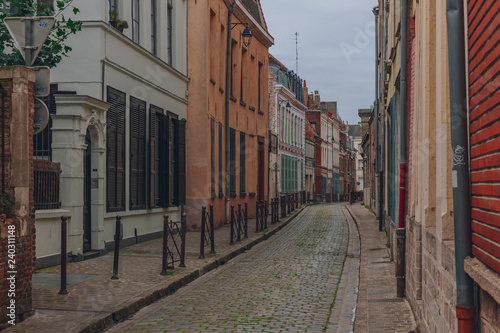 Fototapeta Naklejka Na Ścianę i Meble -  Empty street with traditional architecture in the city center of Lille, France