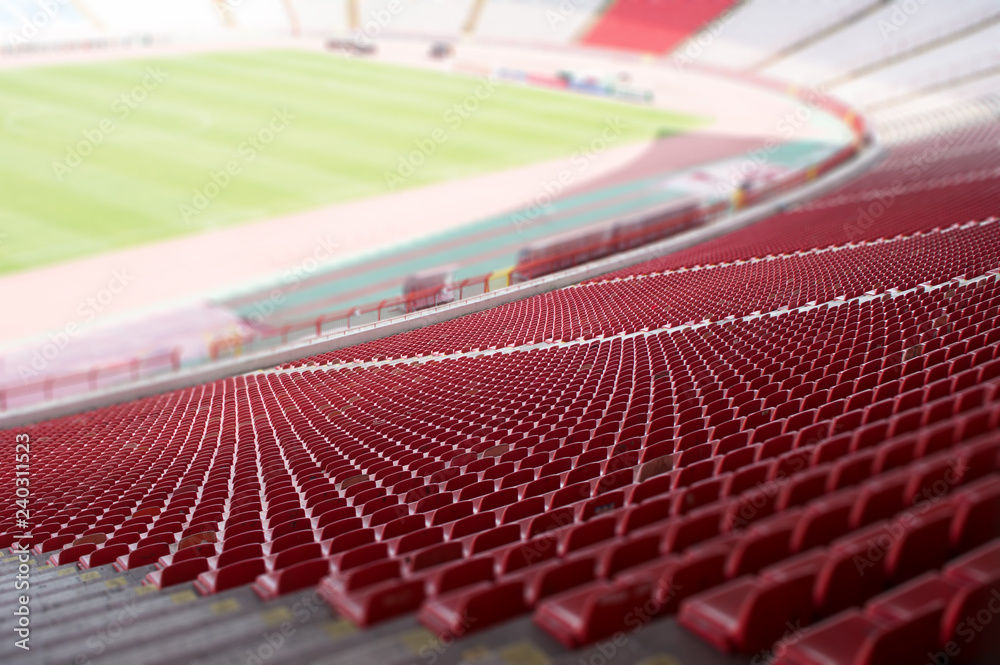 Obraz premium detail of the red seats at the stadium