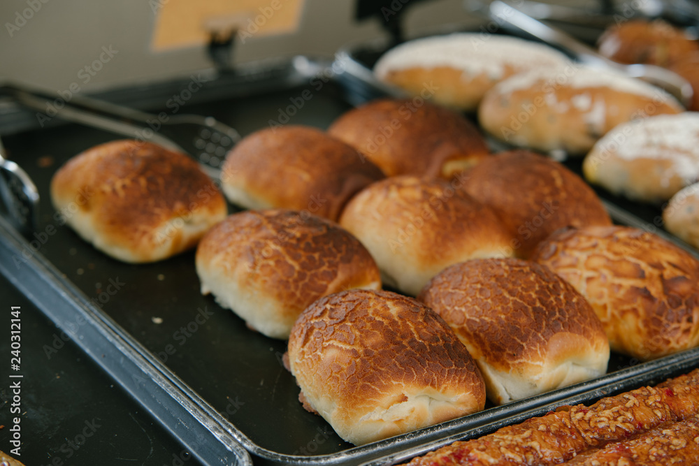Close up of bakers are working.Homemade bread.Eating breakfast with the bread in coffee shop. Morning coffee,Bakery commercial image. Close up of bakers are working.Homemade bread.Eating breakfast with the bread in coffee shop. Morning coffee,Bakery commercial image.