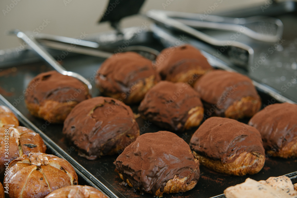 Close up of bakers are working.Homemade bread.Eating breakfast with the bread in coffee shop. Morning coffee,Bakery commercial image. Close up of bakers are working.Homemade bread.Eating breakfast with the bread in coffee shop. Morning coffee,Bakery commercial image.