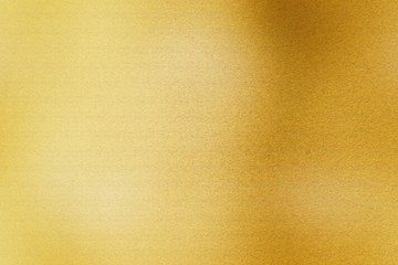 Glowing golden metal sheet texture, abstract pattern background