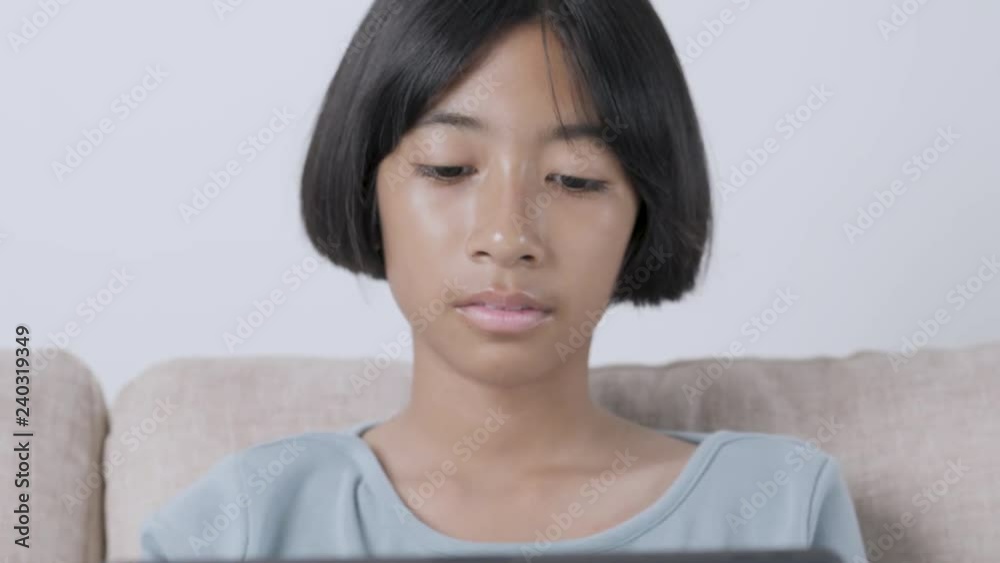 Asian girl using tablet computers for education. Asian girl using tablet computers for education.