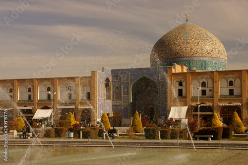 Fountain at Naqsh-e Jahan Square. Sheikh Lotfollah Mosque as a background. Isfahan. Iran photo