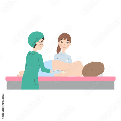 出産する女性。