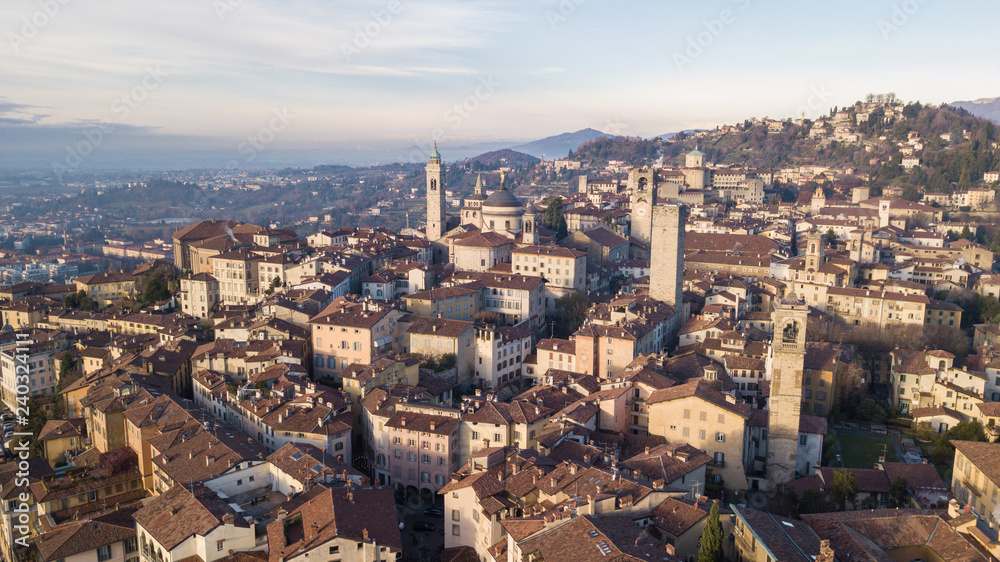 Bergamo, Italy. Drone aerial view of the old town. Landscape at the city center and its historical buildings during winter time
