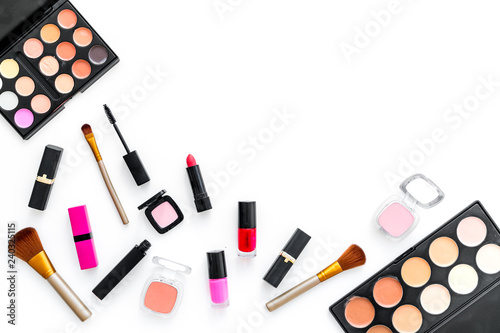 Photo female desk with decorative cosmetics for make up white background top view mock