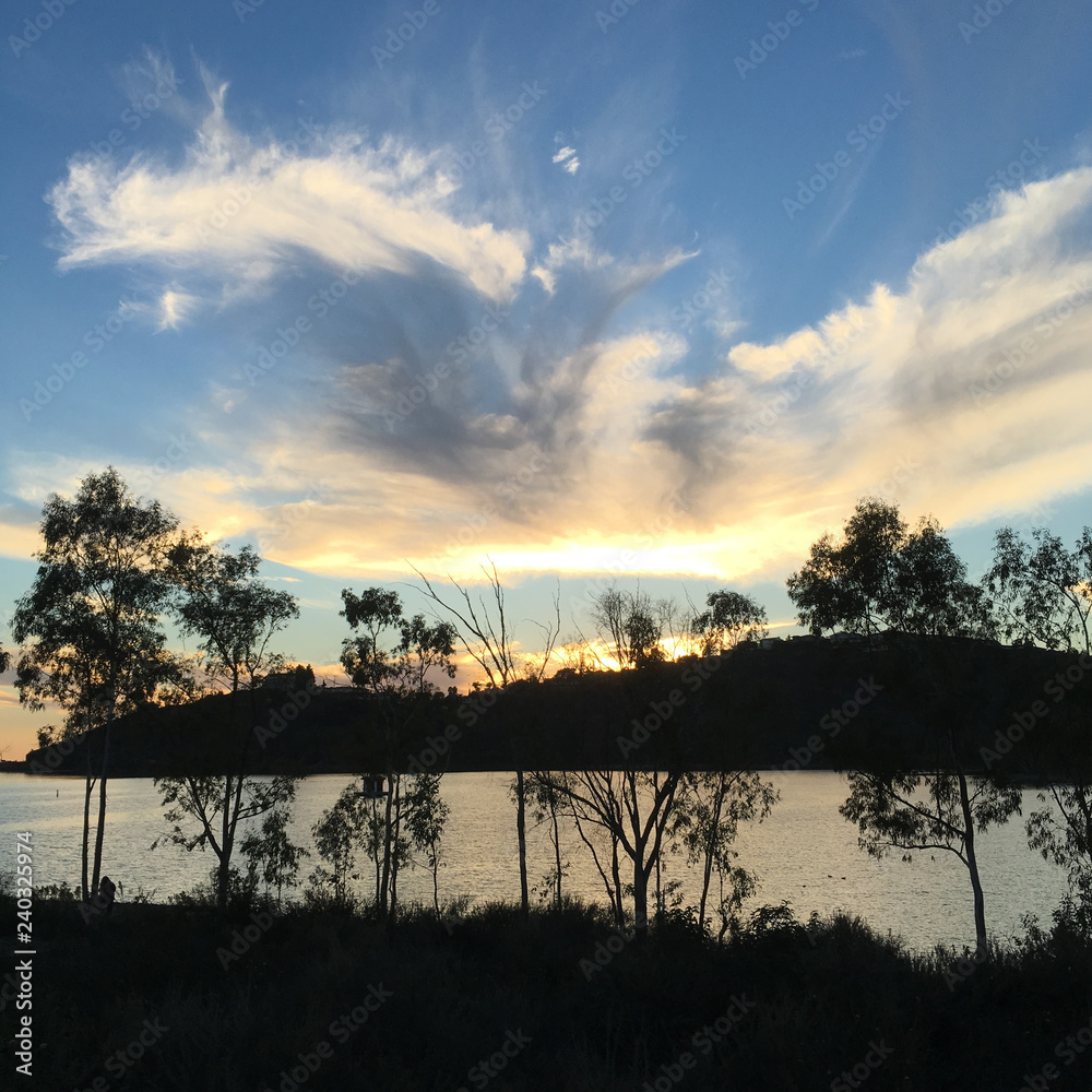 Beautiful sunset over a quiet Lake Murray in San Diego California