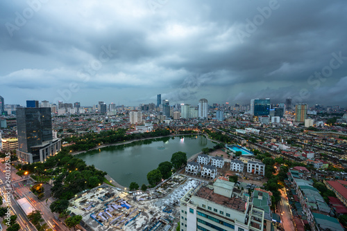Aerial skyline view of Hanoi city, Vietnam. Hanoi cityscape by sunset period at Ba Dinh district viewing from Lang Ha street © Hanoi Photography