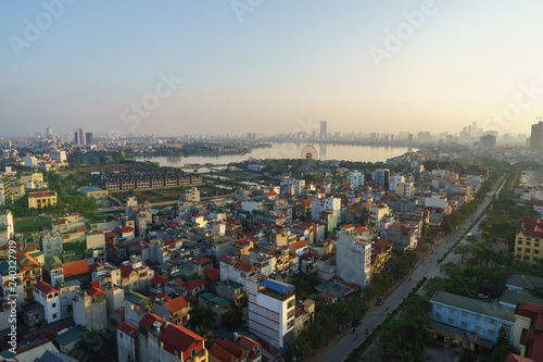 Aerial skyline view of Hanoi city, Vietnam. Hanoi cityscape by sunset period at West Lake, Ho Tay district